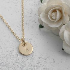 Hand Stamped Gold-filled Initial Necklace - 3/8" round disc. $28.00, via Etsy. Minimalist 14k Gold Hand Stamped Charm Necklace, Dainty Hand Stamped 14k Gold Charm Necklaces, Dainty Hand Stamped Round Disc Necklaces, Dainty Hand Stamped Round Disc Necklace, Minimalist Hand Stamped Initial Necklace For Everyday, Minimalist Everyday Hand Stamped Initial Necklace, Minimalist Yellow Gold Hand Stamped Charm Necklace, Dainty 14k Gold Filled Hand Stamped Necklace, Hypoallergenic Yellow Gold Charm Necklace With Round Pendant