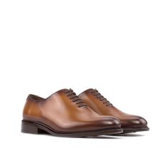 Often considered the most formal men's shoe available, the Wholecut features closed channel lacing and is made from a single cut of leather. The sleek design and limited stitching make for an elegant and highly sought-after style. The Details: Materials: cognac box calf Sole: cognac leather sole with rubber buttons injections Last: Zurigo - Rounded toe for traditional English Look What is Fast Lane? Fast lane is our new experimental 7 day made to order collection, an ambitious never been heard o Cognac Leather Wingtip Shoes With Stitched Sole, Italian Made Brown Dress Shoes For Business, Cognac Leather Shoes With Plain Toe And Leather Sole, Formal Cognac Oxfords With Goodyear Welt, Timeless Cognac Dress Shoes With Brogue Detailing, Timeless Formal Oxfords In Bridle Leather, Cognac Cap Toe Oxfords For Business, Cognac Oxfords With Leather Lining For Business, Cognac Oxfords With Leather Sole For Business