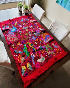 a table with a red cloth on top of it