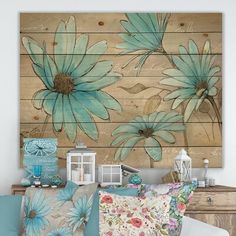 a living room filled with lots of furniture and decor on top of a wooden wall