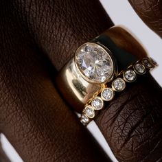 We love a cigar band look, so this addition to our bespoke engagement ring collection was a no-brainer. We love her stacked or solo—the design options are endless. We recommend sizing up a full size due to the width of this design. Not sure about your size? Order a ring sizer tool. Ring pictured features a 1.5ct stone Luxury Stackable Rings With Thick Band For Wedding, Luxury Stackable Rings With Thick Band, Timeless Stackable Wide Band Ring For Anniversary, Luxury Thick Band Ring With Vvs Clarity, Classic Thick Band Diamond Rings, Classic Diamond Rings With Thick Band, Wedding Ring With Single Cut Diamonds And Thick Band, Timeless Ring With Wide Band And Brilliant Cut, Timeless Wide Band Ring With Brilliant Cut