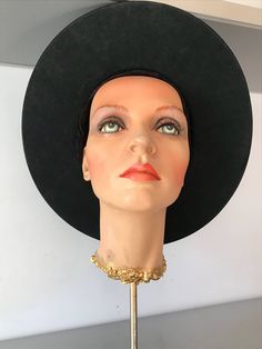 "Hard structure black felt hat. Seems to be an early hat, maybe as early as the 1930's. In good vintage condition. Measurements are: Circumference21\" Dome4\" Brim3\" Feel free to convo me with any further questions. Thank you for your interest." Vintage Black Wide Brim Costume Hat, Vintage Black Costume Hat With Curved Brim, Vintage Black Cloche Hat With Wide Brim, Black Vintage Cloche Hat With Wide Brim, Vintage Black Fedora For Kentucky Derby, Vintage Black Wide Brim Top Hat, Vintage Black Brimmed Hat, Vintage Black Brimmed Fedora, Vintage Black Fedora Hat