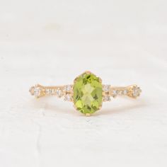 Vintage Peridot Engagement Ring Oval Shaped Rose Gold Diamond - Etsy Classic Wedding Diamond Ring With Peridot, Peridot Birthstone Ring With Center Stone For Wedding, Elegant Peridot Birthstone Ring For Wedding, Elegant Peridot Wedding Birthstone Ring, Peridot Birthstone Ring For Wedding, Lime Green Gemstone Wedding Jewelry, Lime Green Gemstone Jewelry For Wedding, Oval May Birthstone Ring For Wedding, Oval Lime Green Rings For Anniversary