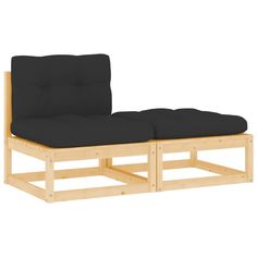 a wooden bench with black cushions on it