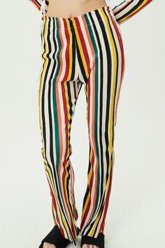 Nadua Striped Plisse Pants Elasticized waistband Loose fit lounge pants Multi color striped pattern * Product Specification 100% Polyester * Flat Measurement: S/M: Waist: 32.5cm (13in) / Hip: 36cm (14.2in) / Thigh: 24cm (9.4in) / Rise: 27cm (11in) / Hem: 31.5cm (12.4in) / Length: 102cm (40.2in) / M/L: Waist: 33cm (13in) / Hip: 39cm (15.3in) / Thigh: 25cm (10in) / Rise: 32cm (12.5in) / Hem: 31.5cm (12.4in) / Length: 104cm (41in) * Professional Clean Only / Do Not Tumble Dry Model's height is 5′ 9″ (177cm) Bust 32.5in Waist 23in Hip 34.5in and wearing S/M 사이즈 정보Size information (단위:cm)(Unit : inch) S/MS/M 사이즈 정보 Size information 허리Waist 32.512.8 엉덩이Hip 3614.2 허벅지Thigh 249.4 밑위Rise 2710.6 밑단Hem 31.512.4 총장Length 10240.2 M/LM/L 사이즈 정보 Size information - 위의 실측사이즈는 '단면의 길이'입니다. 참고해 주세요.- 사이즈는 측정 Stretch Striped Straight Pants, Striped Stretch Wide Leg Pants, Striped Wide Leg Stretch Pants, Striped Stretch Trousers, Trendy Striped Long Pants, Stretch Striped Trousers, Stretch Wide Leg Bottoms With Vertical Stripes, Striped Stretch Pants For Loungewear, Striped Trousers For Loungewear