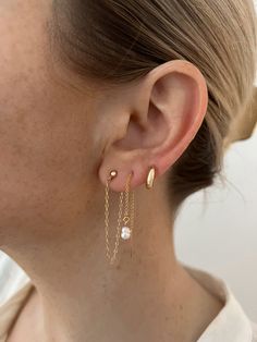 We are in love with this threader style earring! We added a tiny freshwater pearl to elevate this look even more 14k gold filled, water and tarnish resistant Trendy 14k Gold Filled Dangle Jewelry, Dainty Yellow Gold Hoop Earrings With Adjustable Chain, Delicate 14k Gold Filled Threader Earrings, 14k Gold Dangle Cartilage Earrings For Everyday, Everyday 14k Gold Filled Dangle Cartilage Earrings, 14k Gold-filled Yellow Gold Cartilage Earrings, 14k Gold Dangle Cartilage Earrings, Everyday Elegant 14k Gold Filled Cartilage Earrings, Elegant Everyday 14k Gold Filled Cartilage Earrings