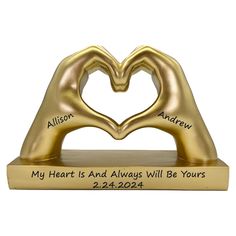 a gold heart shaped trophy with the words my heart is always will be yours