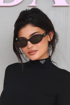 This luxury sunglasses from Prada gives you boujee vibes. It is becoming one of our favourite styles. - Acetate frames- Retro-shaped- Black-hued lenses- Branding to arms 2025 Women’s Sunglasses, Sunglasses Prada Women, Sun Glasses 2024, Prada Glasses Frames Woman, Prada Sunglasses Outfit, Sunglasses Frames For Women, Prada Sunglasses Women, Dress Thinner, Prada Black Sunglasses