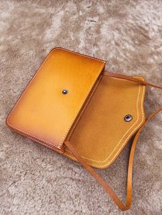 * Its handmade using genuine cow leather nubuck. * Onemain pocket can fit 5.7 iphone6 plus or Samsung note 3 and other small items. * We need 3-5 days to finish the wallet before we can delivery. * High quality and extremely durable cow leather for long lasting and everyday use. * Here are the features of this awesome wallet:  --- Length - 6.9 (17.5cm )  --- Width - 4.5 (11.5cm)  --- Depth(empty) - 1.2 (3cm) Vintage Shoulder Bag Backpack With Large Capacity, Vintage Large Capacity Backpack Shoulder Bag, Vintage Leather Shoulder Backpack With Large Capacity, Travel Satchel Shoulder Bag With Mobile Phone Pocket, Large Capacity Leather Saddle Bag For Daily Use, Travel Bags With Large Capacity, Everyday Leather Flap Bag With Large Capacity, Leather Saddle Shoulder Bag With Large Capacity, Everyday Large Capacity Leather Flap Bag