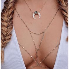 Wear our Peek-a-boo Body Chains (Chain Bra) under your tank top or a bikini top for a hip, trendy, sexy style. It's perfect for music festivals and parties! Super easy to wear! It's just like a halter bikini top: a clasp behind the neck and a clasp behind your back. Silver or Gold Tone (Gold is more rose gold than yellow) Bust width (below your bra): up to about 35 inches This is a special occasion item: FINAL SALE Adjustable Body Chain For Summer Beach, Adjustable Body Chain For Beach In Summer, Adjustable Summer Beach Body Chain, Summer Body Chain For Beach, Summer Beach Body Chain, Bohemian Body Jewelry With Chain For Summer, Bohemian Summer Body Jewelry Chain, Trendy Beach Body Jewelry With Chain, Bohemian Body Chain For Summer