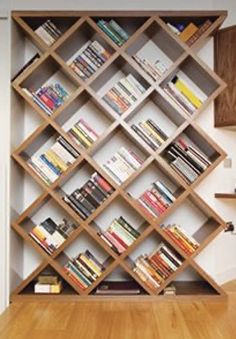 the bookshelf is made out of wooden shelves