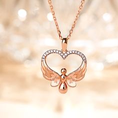 In a heart-shaped halo, an angel spreads her wings to transmit warmth, love, hope, and happiness. Plated in rose gold, the angel character gives you a sense of security and tenderness. With the protection of her beautiful wings crafted with detailed layering, you will harvest love and bliss. Get it as a gift for girlfriend, mother, or kid for birthday, Valentine's, Mother's day, Christmas, or simply a daily surprise. Carat Weight: 0.21 ctStone Size: 1 mmStone Type: Jeulia® StoneNumber of Stones: Angel Character, Flying Angel, Angel Wings Pendant, Beautiful Wings, Romantic Anniversary Gifts, Jewellery Design Sketches, Fancy Jewellery Designs, Angel Jewelry, Angel Heart