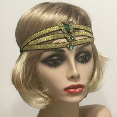 Great Gatsby headpiece, 1920s headband, Flapper headpiece, Gatsby headband, Vintage Inspired, Roaring 20s,  Art Deco, 1920s hair accessory This listing is for a Great Gatsby Headpiece. Made with three rows of a beautiful  Black and Gold metallic trim backed with black satin elastic. I embellished the center of this headpiece with a Vintage Antique Gold and Green Butterfly Rhinestone brooch.   Each piece is uniquely made one at a time with much thought, love and time. In most cases there is only one of a kind. I have designed and created each piece from my smoke-free, pet- free studio.   All pieces are securely wrapped and boxed to prevent damage/breakage. This item is ready to ship! If you have any inquiries, please feel free to convo me. Thank you very much for stopping by at my shop. Hav Roaring 20s Art, Roaring 20s Art Deco, 1920s Hair Accessories, Great Gatsby Headpiece, 20s Art, 1920s Headband, Gatsby Headpiece, Flapper Headpiece, Gatsby Headband