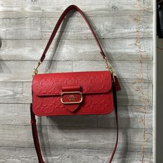 Never Used But I Did Take The Tags Off With The Intention Of Using It. I Received A Different One That’s Similar For My Birthday And I’ll Be Keeping That One Instead. New Without Tags. The Listing Price Is What They Say In The Coach Outlet As Comparable Price. Luxury Coach Rectangular Satchel, High-end Red Leather Shoulder Bag, Red Rectangular Satchel With Detachable Strap, Designer Coach Clutch Shoulder Bag, Red Flap Bag For Shopping, Classic Red Flap Bag With Detachable Handle, Luxury Red Satchel With Detachable Strap, Luxury Red Shoulder Bag With Removable Pouch, Designer Coach Rectangular Satchel