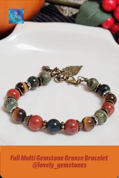 New addition to our fall jewelry collection - Bronze Fall Gemstone Bracelet in earthy tones of brick red golden brown and green. This beautiful multi stone bracelet is made of red jasper, tiger's eye, serpentine and bloodstone beads.
Would be a great gift for your loved ones for birthday or any holiday.
Please follow us for updates on:
Instagram, Pinterest and Tik Tok @lovely_gemstones Red Jasper Jewelry, Red Stone Bracelet, Red Jasper Bracelet, Charm Bracelets For Girls, Handmade Charm Bracelets, 40th Birthday Gifts For Women, Bronze Bracelet, Red Jasper Stone