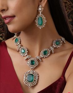 Sparkly Emerald Doublet Victorian CZ Long Necklace with AAA quality CZ stones and fine Kundan. Real Emerald Doublet stone user This necklace comes with Earrings as well Necklace Length - 21 inches Earrings Length- 2.5 inches This Long Necklace has global appeal and represents elements of Indian, Pakistani as well as Punjabi Jewelry 18 K Victorian plated Earrings Closure: Pushback Necklace length Adjustable with chain  Earrings have pushbacks  Highest quality and craftsmanship Please let me now if you have any questions Customized orders takes 3 to 4 weeks, depending on piece requirements. The Ombre Designs Jewelry pieces can be customized in accordance with your requirement. Please Email or Whats app on : +91 8448833193 / sonalikamehra [!at] theombredesigns.com Luxury Gift Emerald Chandbali Necklace, Luxury Kundan Emerald Necklace, Luxury Heavy Green Temple Necklace, Opulent Hand Set Jewelry For Formal Occasions, Opulent Hand-set Jewelry For Formal Occasions, Exquisite Emerald Diamond Necklace, Elegant Round Jewelry With Stone Work, Elegant Silver Jewelry With Stone Work, Elegant Kundan Jewelry Sets With Stone Setting