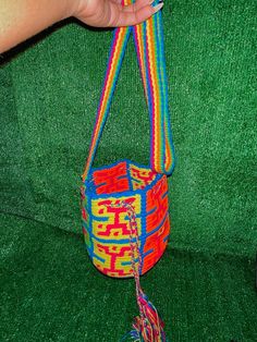 Unique traditional Colombian Wayúu mochilas with long handle   🧶Mini bag is a finished product, I'll be shipping with the exact color on the picture🧶 Bag length without handles: 6 1/2 inches Bag width: 5 inches Bag handle length: 23 inches Traditional Multicolor Rectangular Bag, Green Bag With Long Strap For Daily Use, Green Long Strap Bag For Daily Use, Bohemian Rectangular Bag With Long Strap, Traditional Yellow Shoulder Bag For Daily Use, Bohemian Bag With Long Strap, Bohemian Bag With Long Strap For Daily Use, Bohemian Bags With Long Strap For Daily Use, Rectangular Woven Bucket Bag As Gift