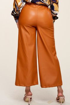 • SKU:| PP-1511• S-M-L• Hand wash only• Made from high-quality PU leather, these pants are soft, comfortable, and built to last.• The sleek and modern design makes them perfect for dressing up or down, while the high-waisted fit provides a flattering silhouette. Faux Leather Wide Leg Pants For Fall, Sleek Wide-leg Leather Pants For Fall, Sleek Leather Bottoms For Fall, Trendy Wide-leg Leather Pants, Leather Wide Leg Pants For Workwear In Fall, Brown Faux Leather Pants With Pockets, Sleek Leather Wide-leg Pants, Fall Brown Wide-leg Leather Pants, Fall Faux Leather Wide-leg Pants