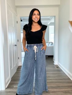 Enhance your fall wardrobe with our Mineral Wash Wide Leg Soft Denim Bottoms. Made with a mineral wash for a unique finish, these bottoms feature a drawstring elastic waistband for ultimate comfort and a versatile fall outfit option. Elevate your style with these high-quality, on-trend denim bottoms. mineral washed, soft cotton denim elastic waistband for an easy true to size fit wide straight leg bottom models are in sizes small (5’8 & 5’2) & large (5’1) These ship in 1-3 business days to pair with your favorite fall sweater or bodysuit! Chic Wide Leg Pants With Drawstring In Relaxed Fit, Spring High Rise Wide Leg Casual Pants, Chic Wide Leg Pants With Drawstring And Relaxed Fit, Casual High Rise Wide Leg Pants For Spring, Casual High Rise Wide Leg Pants For Summer, Spring Casual High Rise Wide Leg Pants, Summer Medium Wash Wide Leg Cotton Pants, Summer Medium Wash Cotton Wide Leg Pants, Summer Wide Leg Cotton Pants In Medium Wash