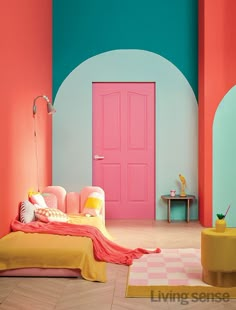 a bedroom with pink, blue and yellow colors on the walls is pictured in this image