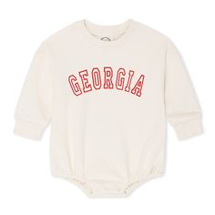 Let your mini fans flaunt their love for game day with our personalized embroidered sweatshirt bubble. You get to pick the name and thread hue! Crafted from 100% cotton, the Unisex Sweatshirt Bubble Romper features your chosen name embroidered in the color of your preference. So go ahead, dress your little one up in our Game Day Sweatshirt Bubble, and root for your favorite football team! Perfect for football fan babies, this outfit will have them scoring all the cute points. Game Day Cotton Tops With Embroidered Logo, White Letter Patch Top For College, White Top With Letter Patch For College, White College Top With Letter Patch, Cotton Tops With Embroidered Logo For Fan Gear, School Spirit Tops With Embroidered Logo For Game Day, Game Day Tops With Embroidered Logo, Collegiate Tops With Letter Patch For Game Day, Team Spirit Tops With Letter Embroidery For Game Day