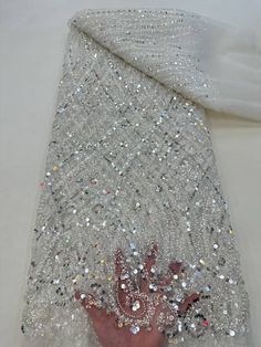 This high quality Fabric is measured in 5 Yards With Embroidered Beading and Sequin. It is soft, very delicate and beautiful. This high Quality Fabric is made with Fashion embroidered rhinestones can be used in making party wedding dresses, skirts, shawls, scarves and other other fashion apparels as you would like. Size : Length : 5 yards (180 inch). Width: 50 inch (Please allow slight deviation for the measurement data ,±1 inch) Material: 100% Polyester, Tulle Lace Fabric, Eco-Friendly embroide Beaded Lace Fabric, Beaded Tulle, Womens Wedding Dresses, Light Ivory, African Lace, African Beads, Cloth Material, Chantilly Lace, Sequins Embroidery