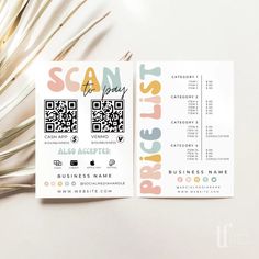 two business cards with qr code on them next to a palm leaf and scissors