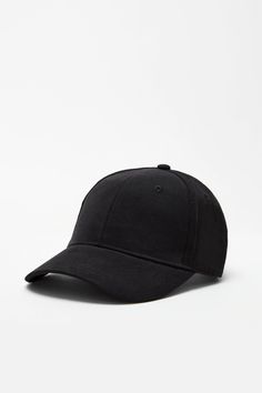 Our baseball hat is the perfect topper for any outfit, and the easiest way to channel off-duty cool or inject athleisure energy into your look. Featuring an embroidered Marcella logo at the back, plus an adjustable strap with a metal clasp to fine-tune your fit. In classic NYC black. | Available in one size. Adjustable fit. Approximately 7.5 inches (19 cm) across, plus approximately 2.75" front bill (7 cm).European Cotton Blend (95% Cotton, 5% Elastane).Spot clean with a damp cloth, or handwash Trendy Solid Color Baseball Cap For Everyday, Casual Snapback Baseball Cap With Cotton Sweatband, Sporty Baseball Cap With Curved Visor For Streetwear, Casual Baseball Cap With Curved Visor, Trendy Solid Color Baseball Cap For Streetwear, Sporty Streetwear Baseball Cap With Curved Visor, Classic Solid Baseball Cap For Everyday, Classic Solid Color Baseball Cap For Everyday, Adjustable Fit Baseball Cap With Curved Visor For Streetwear