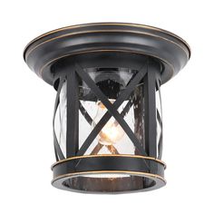 an outdoor light fixture with glass and metal trims on the top, against a white background