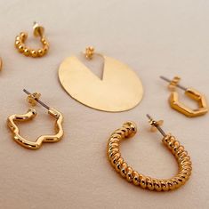 Welcome to AVINZIA, here you'll discover a stunning collection of affordable, tarnish-free gold jewelry featuring exclusive designs. Click on this link to explore our shop: https://www.etsy.com/shop/AVINZIA We pride ourselves on our quick response time, so don't hesitate to reach out with any questions! Please note that all sales are final. However, we offer store credit and exchanges within 14 days of delivery. Processing for exchanges takes 3-5 business days after delivery, and we reserve the right to refuse returns that don't meet our criteria. We also sell charms separately if you prefer! Not sure about the size? Reach out to us before placing your order, and we'll provide all the details you need. If you're looking for a custom item or your favorite product is out of stock, get in tou Delicate Gold Earrings, Minimalist Gold Earrings, Necklace Measurements, Dainty Gold Earrings, Minimalist Earrings Gold, Dainty Hoop Earrings, Chain Extenders, Dainty Earrings, Gold Filled Jewelry