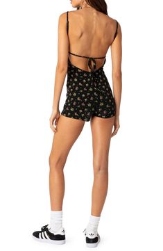 A delicate floral print decorates this stretchy cotton romper crafted with a tie-detailed open back. Square neck Adjustable straps 95% cotton, 5% spandex Machine wash, dry flat Imported Floral Print Mini Jumpsuits And Rompers For Day Out, Summer Floral Print Mini Jumpsuits And Rompers, Summer Floral Print Mini Jumpsuit Or Romper, Summer Floral Print Mini Jumpsuit, Floral Print Mini Jumpsuits And Rompers For Vacation, Floral Print Mini-length Jumpsuits And Rompers For Vacation, Casual Floral Print Mini Jumpsuits And Rompers, Fitted Short Jumpsuits And Rompers For Spring, Summer Floral Print Mini Romper