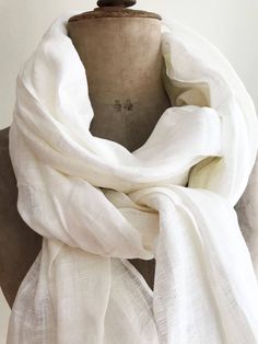 "Lovely, gauzy, lightweight white linen scarf in a generous size. Wonderful linen texture, natural wrinkles. Made from high quality 100% European linen. Edges are frayed for more casual look and fixed to prevent further fraying. A great item in your wardrobe that will be joy to wear in summer as well as in winter. Dimensions: approximately 29.5\" x 78.7\" [75 x 200 cm] Care instructions: - gentle wash cycle - preferably lukewarm water - straighten and hang to dry - It will become softer with eve Classic White Scarf For Gift, Shawl For Men, Big Scarf, Linen Scarf, White Scarf, Linen Scarves, White Scarves, Linen White, Dyed Linen