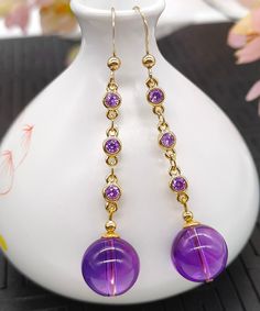 Skinny Purple Smooth Finish 14K Gold Crystal Tassel Drop EarringsMade of fine 14K Gold Crystal.Measurement: 6cm/2.34" * 1.3cm/0.507". Matches easily with daily hairstyle, dresses & Shirts Luxury Gold Amethyst Earrings, Elegant Amethyst Dangle Earrings, Gold Amethyst Long Drop Earrings, Elegant Amethyst Round Earrings, Elegant Gold Amethyst Chandelier Earrings, Elegant Gold Chandelier Earrings With Amethyst, Elegant Round Amethyst Earrings, Gold Amethyst Earrings For Parties, Elegant Latkan Earrings With Round Beads