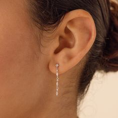 Introducing our stunning Dainty Diamond Drop Earrings—ideal for adding a touch of extra beauty and grace to any wedding attire. With alternating Marquise and Round diamond gemstones, these earrings are a perfect choice for bridesmaids or anyone looking to elevate their style for a special occasion! SKU: RR-ER445 Product Details Material: High Quality Solid 925 Sterling Silver Finish: 18K Gold ∙ Sterling Silver Featuring dainty ~28mm dangling Stud Earrings with ~1-2mm Round and ~3x1.5mm Marquise Dainty Dangle Earrings Silver, Dainty Drop Earrings, Bridal Dangle Earrings With Diamond Cut, Diamond Cut Bridal Earrings For Anniversary, Diamond Cut Bridal Earrings In Fine Jewelry Style, Anniversary Chandelier Earrings With Long Drop, Anniversary Long Drop Chandelier Earrings, Diamond Cut Dangle Earrings For Wedding, Fine Jewelry Linear Earrings For Wedding