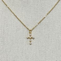 Small Pearl Cross Pendant on Dainty Chain Necklace, Gift for Her, Christian Baptism Necklace Item details ✰ Color: gold, silver ✰ Finish: matte finish 14K gold/ silver plated pendant ✰ 10mm x 15mm pendant  ✰ Shimmering high quality 15-19" chain length ✰ High quality clasp to finish  ✰ Comes in a cute gift box, perfect for gift-giving! Christian Baptism, Dainty Chain Necklace, Cute Gift Boxes, Dainty Chain, Cute Gift, Necklace Gift, Charm Necklaces, Chain Lengths, Cross Pendant