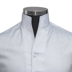 "Men's High Open V Collar Grey 100% Cotton Long Sleeves Dress Shirt MADE-TO-ORDER CLOTHES Shirt Style: Karl Lagerfeld Style/ High Chinese Mandarin Collar/ High Open V Collar Collar Style: 3\" High Stiff Buttonless Collar Pockets: Without pocket (Chest pocket can be added on request) Fabric: 100% Giza cotton soft & comfortable fabric Sleeves: Full Sleeves/ Long Sleeves Fine stitched (20-21 stitches per inch) Cleanly finished buttonholes Flat Felled Seams Hand cut and sewed individually High-quality tailoring Savile Row / British style collar Cuff: 4\" wide single cuff, with 3 buttons These shirts are made with a single cuff. For the double cuff, please leave us a message. * The shirts are made on order in our family-run workshop. Thus we take this long to ship. Every piece is individually h Mens High Collar Shirts, Male Closet, Grey Dress Shirt, Karl Lagerfeld Style, Casual Grooms, Karl Lagerfeld Fashion, High Collar Shirts, Open Collar Shirt, Long Sleeve Cotton Dress