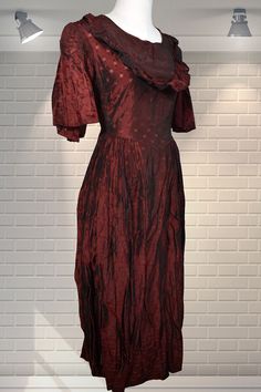 This dress is beautiful.  I love the fabric, style, sleeves - everything. It's a deep wine coloured rayon with an open weave (similar to Bitesize Shredded Wheat if you're in the UK). There are pleats on the frilled sleeve and pintucks on the bib. In very good cared for condition - it's a bespoke handmade piece. It measures like a modern day UK 8 Chest: 32" Waist: 26" Hips:  Free Shoulder to hem:  48" Please ask if you have any questions :) Please note:  this is a used item, not new and not prist Vintage Burgundy Dress For Evening, Vintage Burgundy Evening Dress, Vintage Burgundy Party Dress, Burgundy Vintage Evening Dress, Red Vintage Dress For Formal Occasions, 1940s Party Dress, 1940s Party, Party Dresses Uk, Open Weave