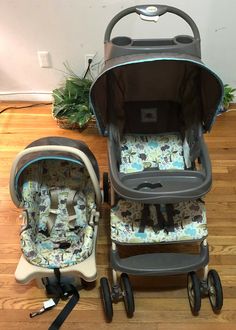 two baby strollers sitting next to each other on a wooden floor