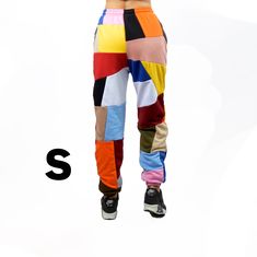 We offer a unique and colorful patchwork design pants. The colors of each model are unique and not repeatable. Add stylish and vibrant notes to your look. This demi-season clothes is made of the highest quality cotton fabric, very comfortable and pleasant to the touch. The pants are very comfortable and do not restrict movement, suitable for home, jogging, yoga, walking in the fresh air. If you like bright and unusual things, then this sweatpants will be a great choice for you or for those to wh Stretch Cotton Color Block Bottoms, Stretch Cotton Bottoms With Color Block, Sporty Multicolor Bottoms With Elastic Waistband, Sporty Multicolor Loungewear Bottoms, Sporty Multicolor Long Pants, Multicolor Cotton Sweatpants With Elastic Waistband, Casual Multicolor Patchwork Pants, Casual Multicolor Joggers With Elastic Waistband, Multicolor Athleisure Bottoms With Elastic Waistband