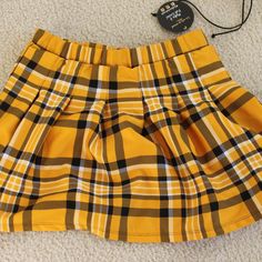 Medium Yellow Game Day Skirt. Never Worn, New With Tags Yellow Mini Skirt For School, Yellow School Skirt For Spring, Summer Yellow Pleated Skirt, Yellow Pleated School Skirt, Casual Fitted Yellow Mini Skirt, Yellow Pleated Mini Skirt For Summer, Yellow Pleated Skirt For School, Casual Yellow Pleated Skirt, Casual Yellow Skirted Bottoms