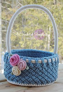 a crochet basket with flowers on it and the words, easter basket crochet pattern