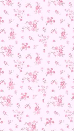 a pink flowered wallpaper with small flowers on it