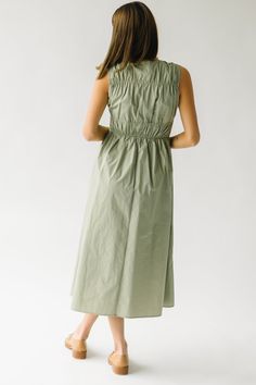 Get ready to turn heads in The Laserna Tie Detail Midi Dress in Sage! This stunning dress features a unique tie detail that adds a touch of elegance to the classic midi style. Perfect for any occasion, this dress will make you feel confident and stylish. Don't miss out on this must-have piece for your wardrobe! Details self/lining: 100% cotton Fabric Care Guide Here Sizing & Fit Measurements are approximate and taken while laying flat across the front. Not doubled. small: bust = 18"; waist = 14" Spring Midi Dress With Tie Fastening For Brunch, Spring Brunch Midi Dress With Tie Fastening, Midi Dress With Tie Waist For Brunch, Midi Length Dress With Tie Waist For Brunch, Chic Midi Dress With Gathered Waist, Chic Spring Dresses With Tie Fastening, Chic Dresses With Tie Fastening For Spring, Spring Brunch Dresses With Tie Fastening, Spring Maxi Dress With Tie Fastening