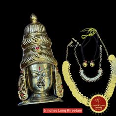 Design by Classical Dance Jewelry® ❥ Product Details: Designer Brass decorated Goddess Varalakshmi Ammavaru Face , Crown kireetam 9 Piece set ❥ Material is Brass alloys ❥ Color: Gold, Brass ❥ Beautiful Goddess Lakshmi face set used for varalakshmi Vratham ❥ Beautifully embossed mask used for pooja during Varalakshmi Vratham ❥ Very Heavy Face ❥ Beautifully decorated mask used for pooja during Varalakshmi Vratham ❥ Completely Decorated with High Quality Stones and pearls 🎈We will send item that a Bollywood Style Sets With Latkans For Traditional Ceremonies, Festive Sets With Latkans For Puja, Diwali Temple Jewelry Sets With Latkans, Saree With Latkans For Traditional Ceremonies And Navratri, Traditional Heavy Lehenga For Navratri, Gold Festival Sets, Navratri Puja Lehenga With Latkans, Ceremonial Chandbali Sets With Latkans, Traditional Navratri Sets With Latkans