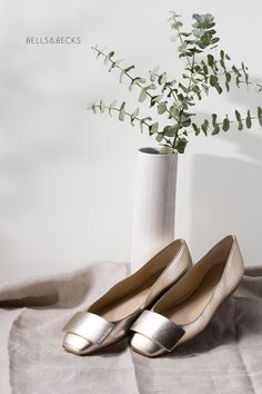 A beautiful metallic flat that adds a chic vibe to your favorite outfit. Made in Italy with extra cushion for comfort, its time to wear it like the queen you are 👑. Bells & Becks is a female founded and owned business created as a lifelong dream come to life. For women over 50 fashion and women under 50 fashion, Bells & Becks offers shoes for women that are confident and know what they deserve. Luxure lifestyle should be attainable, not just aspirational. Here's to minimalist beautiful living. Gold Slip-on Ballet Flats For Party, Elegant Metallic Flats For Party, Elegant Metallic Closed Toe Flats, Elegant Metallic Flats For Spring, Elegant Low Heel Flats With Metal Feet, Gold Pointed Toe Flats For Party, Chic Slip-on Wedding Flats, Gold Pointed Toe Flats For Workwear, Gold Flats For Spring Wedding