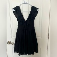 Nwot Abercrombie And Fitch Black Ruffle Mini Dress. Xsp Elegant Black Flowy Mini Dress, Black V-neck Mini Dress Lined, Black Flowy Knee-length Mini Dress, Black A-line Flowy Mini Dress, Black Flowy A-line Mini Dress, Black Flowy A-line Dress, Black Flowy Mini Dress For Party, Black Flowy V-neck Mini Dress, Black Flowy Dress For Formal Occasions