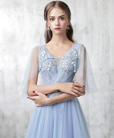 Light Blue Tulle Dress For Banquet, Light Blue Tulle Dress For Prom Season, Light Blue Tulle Dress For Evening, Light Blue Floor-length Tulle Dress, Formal Tulle Dress With Short Sleeves, Light Blue Tulle Bridesmaid Dresses, Blue Tulle Dress For Formal Occasions, Formal Blue Tulle Dress, Blue A-line Mini Dress For Wedding