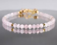 Madagascar Rose Quartz Bracelet, Sun Bracelet, Pink Bracelet, Fertility Gemstone Bracelet, Love Bracelet, Healing Gemstones, Protection Gift - Etsy Elegant Rose Quartz Healing Jewelry, Elegant Rose Quartz Jewelry For Healing, Minimalist Pink Round Bracelet, Rose Quartz Round Beads Jewelry For Valentine's Day, Elegant Rose Quartz Crystal Bracelet For Gift, Rose Gold Gemstone Bracelets For Gift, Elegant Rose Quartz Crystal Bracelet Gift, Rose Gold Gemstone Bracelet For Gift, Valentine's Day Rose Quartz Beaded Jewelry