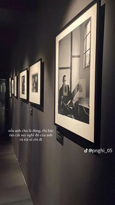 black and white photographs hanging on the wall