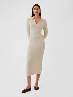 Supersoft cotton-blend ribbed knit midi polo sweater dress.  Polo collar.  Long sleeves.  Fit: Slim.  A slim silhouette that fits close to the body.  Hits below the knee.  Models wearing Gap Sweater Dress With Sneakers, Wardrobe Revamp, Dress With Collar, Seasonal Living, Sweater Dress Outfit, Plush Yarn, First Communion Dresses, Ribbed Dress, Communion Dresses